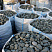 Kamenclub.ru: Галька речная плоская (темно-серая) фр. 100-200-300 мм. купить  в Белгороде галька речная плоская темно-серый, серый, синий речной галечник плоский 9000 руб/т   фото КАМЕНЬ КЛУБ